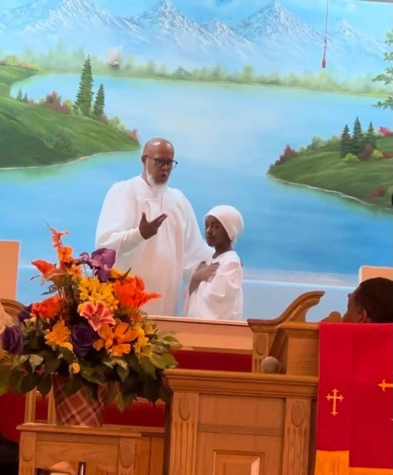Baptism service in a church sanctuary